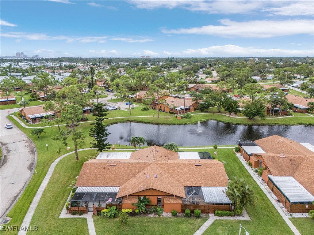 a aerial view of a house with a big yard