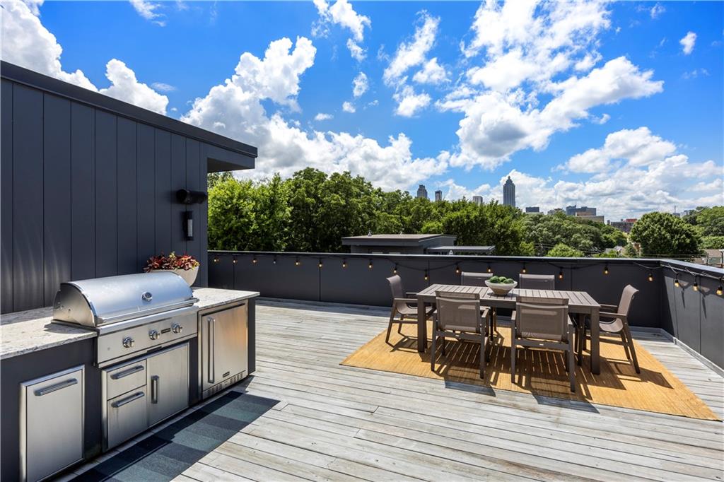 a view of a terrace with furniture