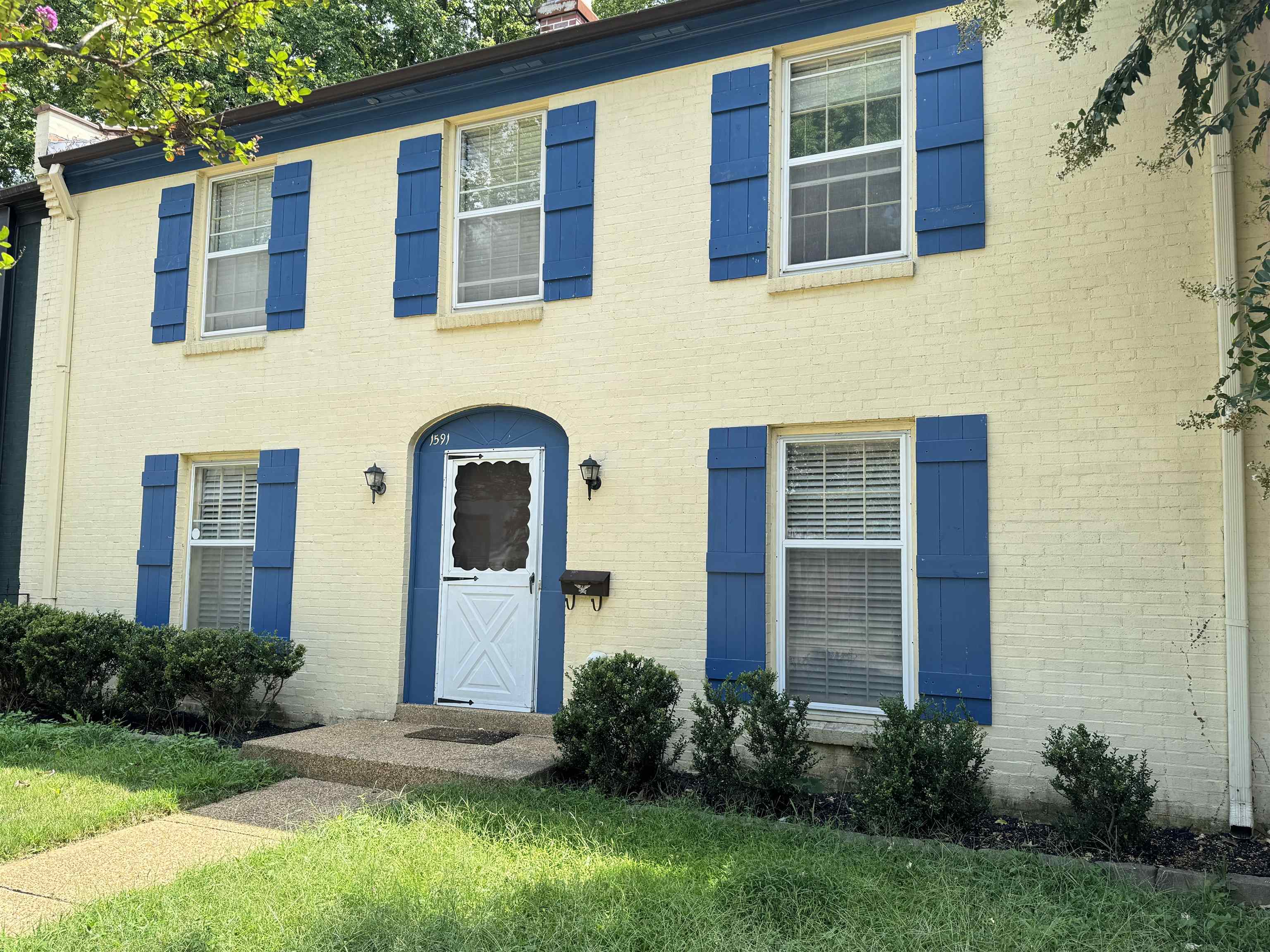 a front view of a house having yard