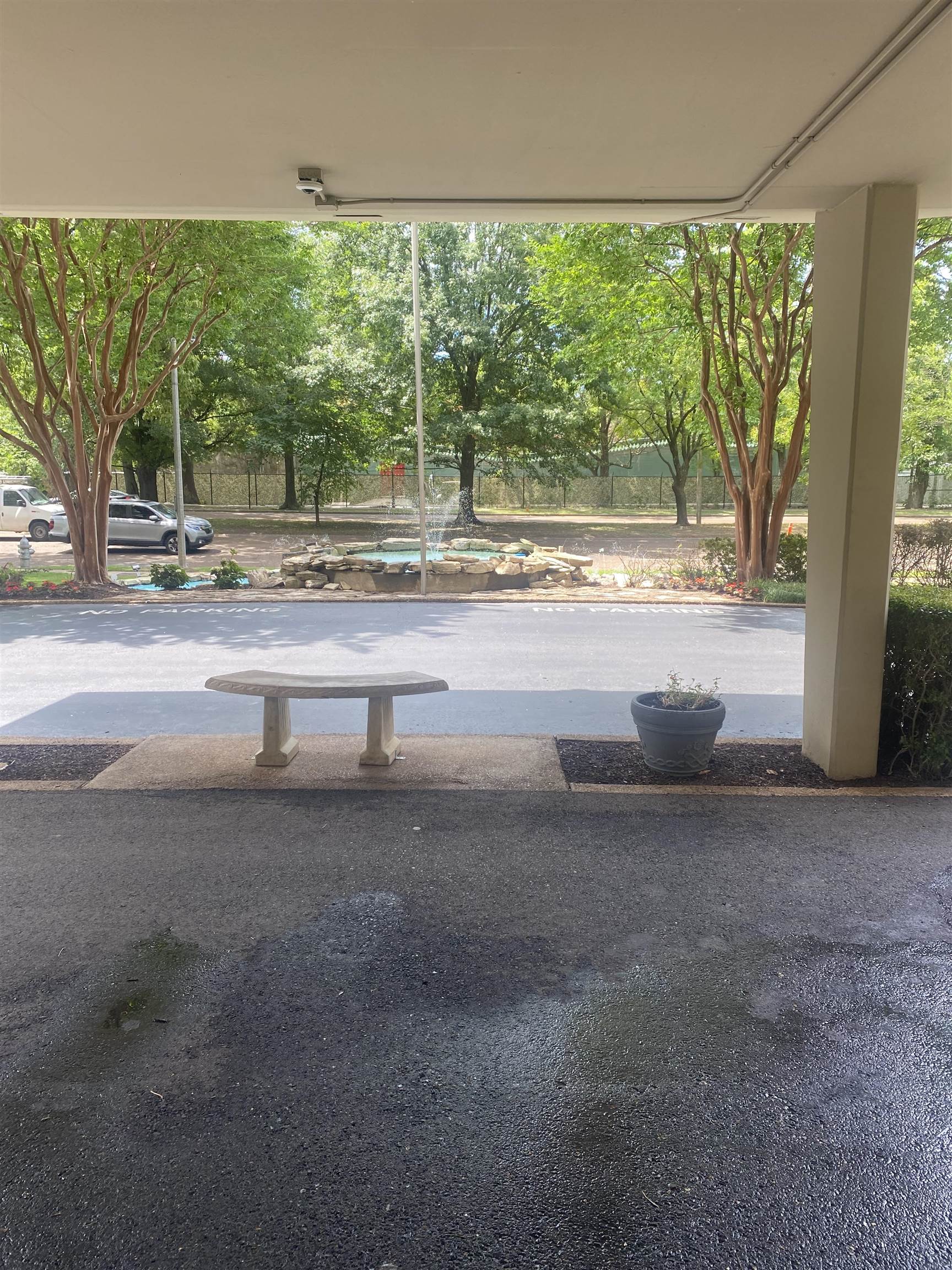 a view of a yard with porch and outdoor seating