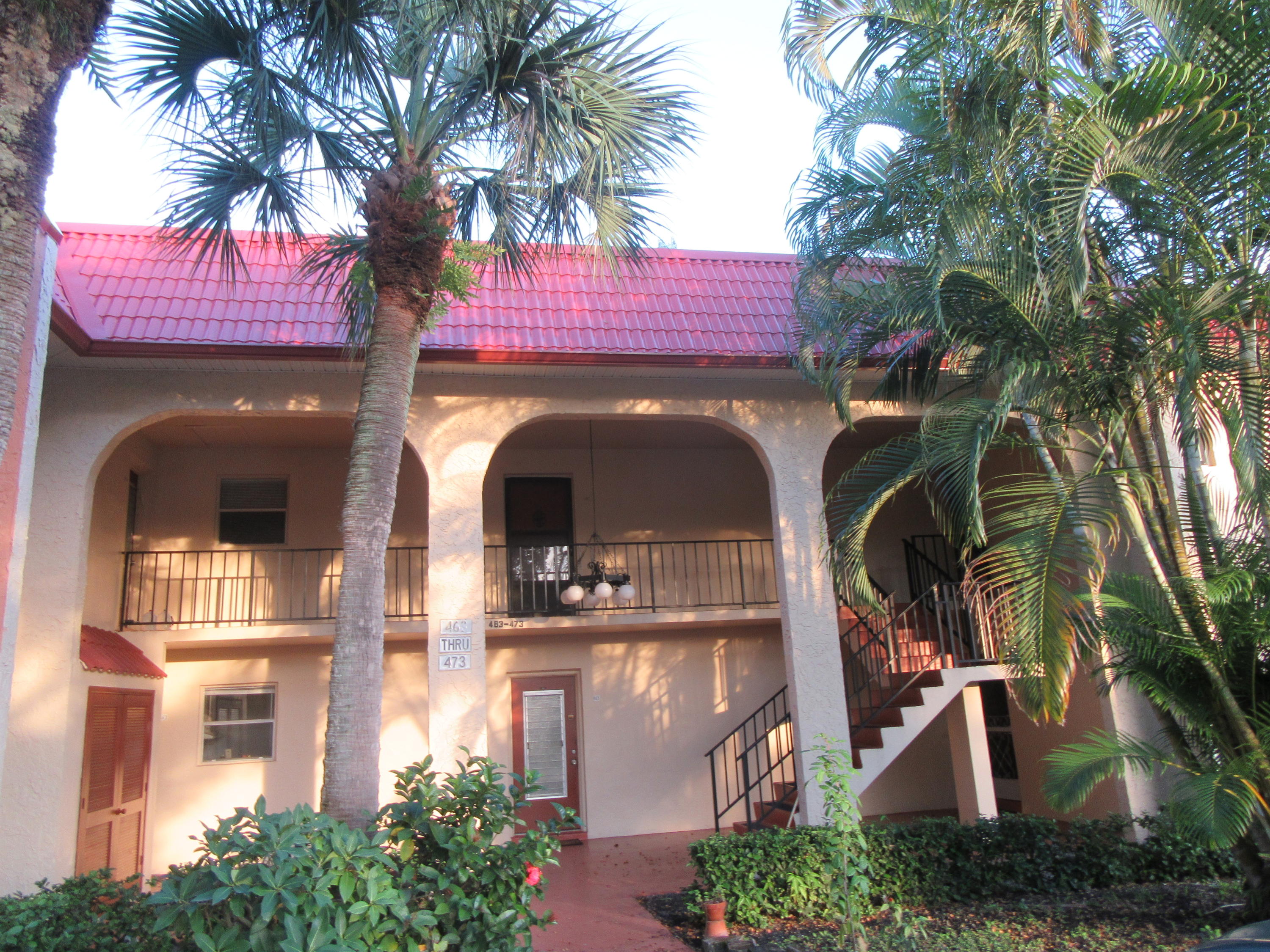 a view of a house with a cars park