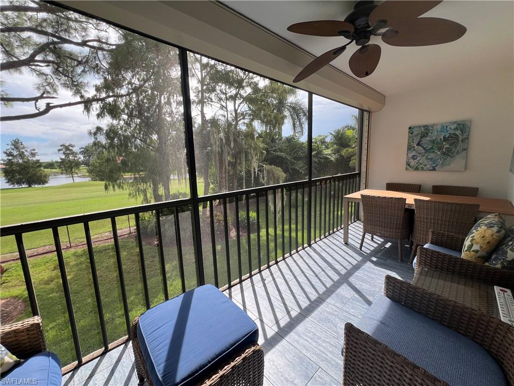 a view of a balcony with furniture