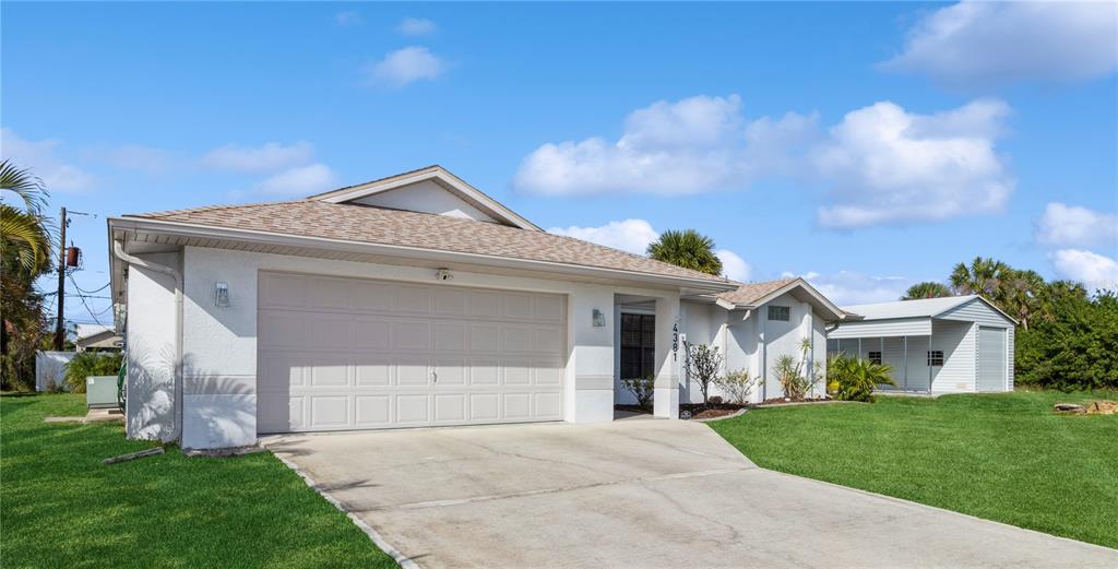 DOUBLE LOT WITH OVERSIZED GARAGE