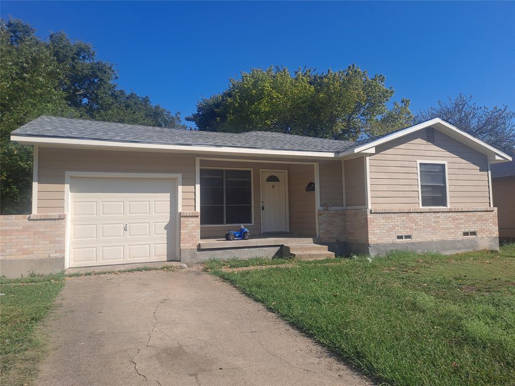 front view of a house and a yard