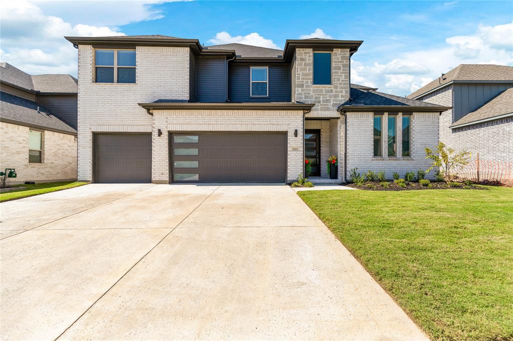 a front view of house with yard