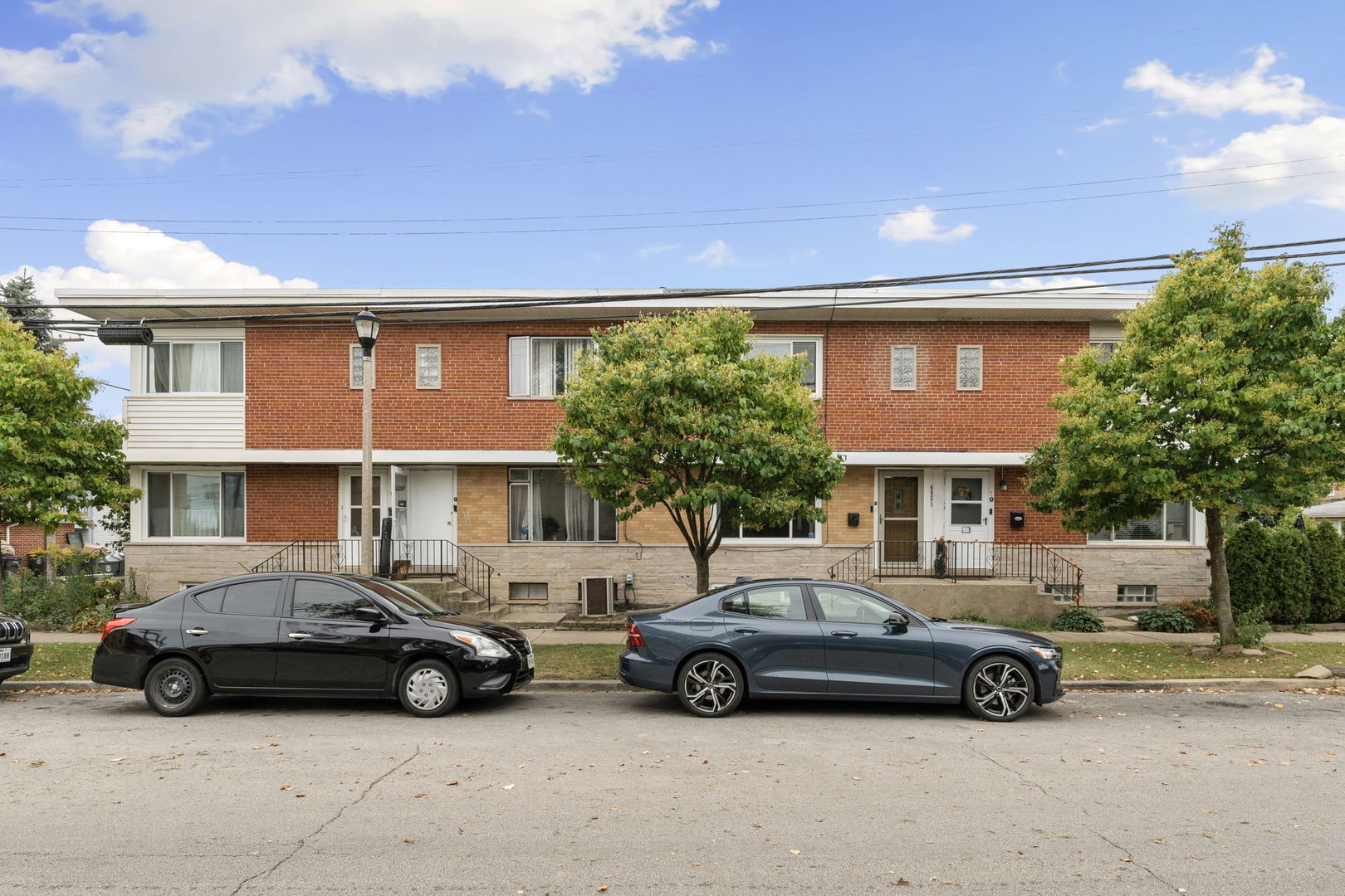 a car parked in front of a house