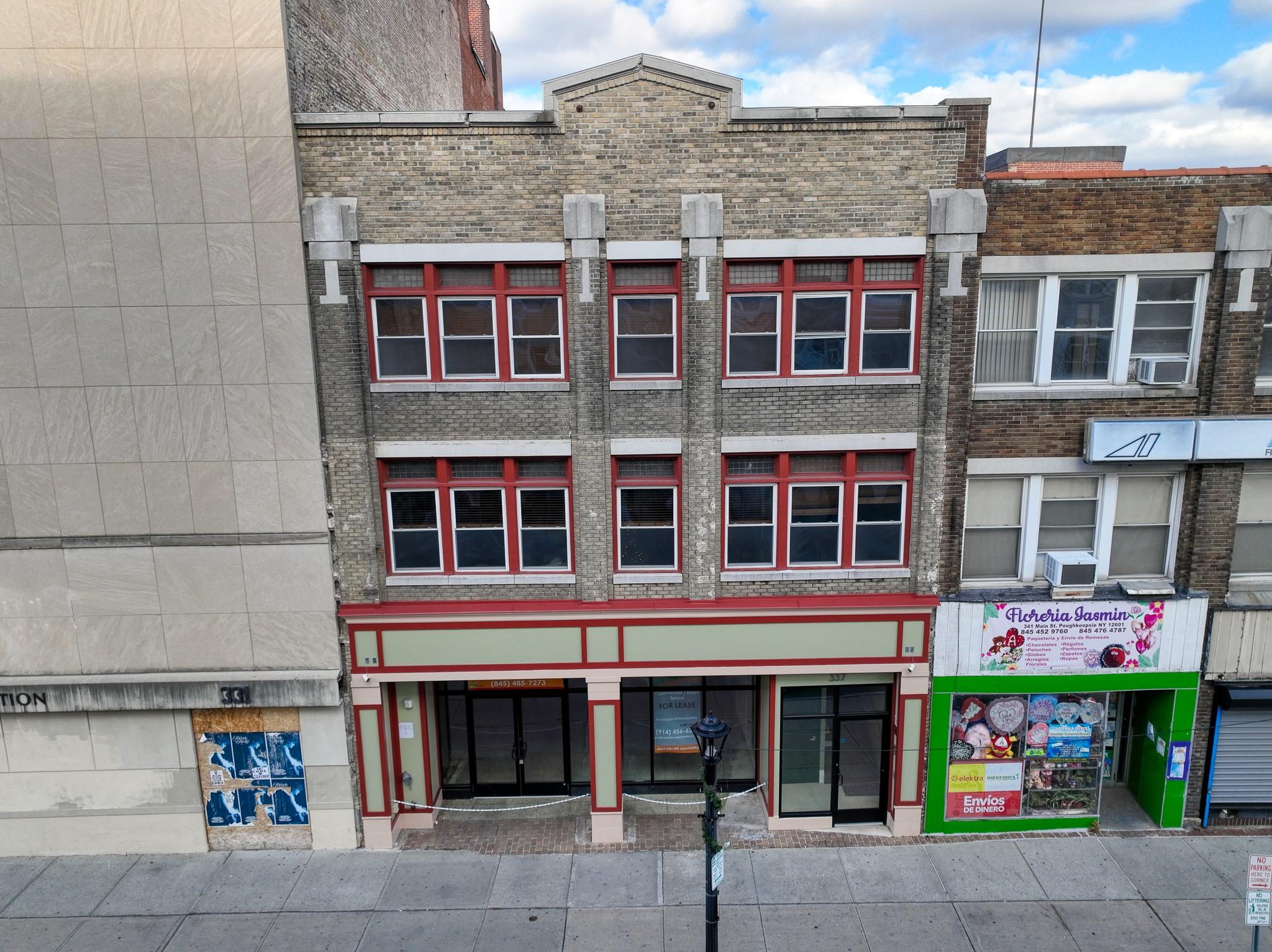 a front view of multi story residential apartment building