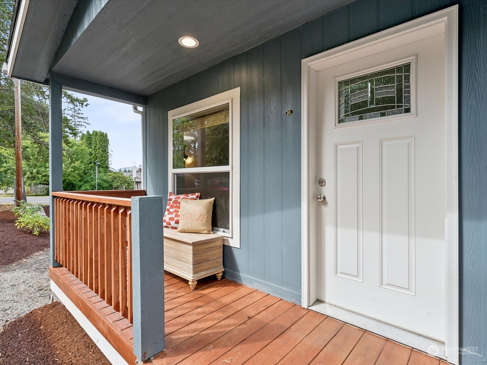 a view of a balcony and wooden floor