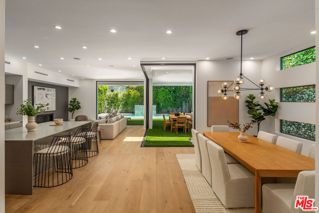 a lobby with furniture and floor to ceiling window