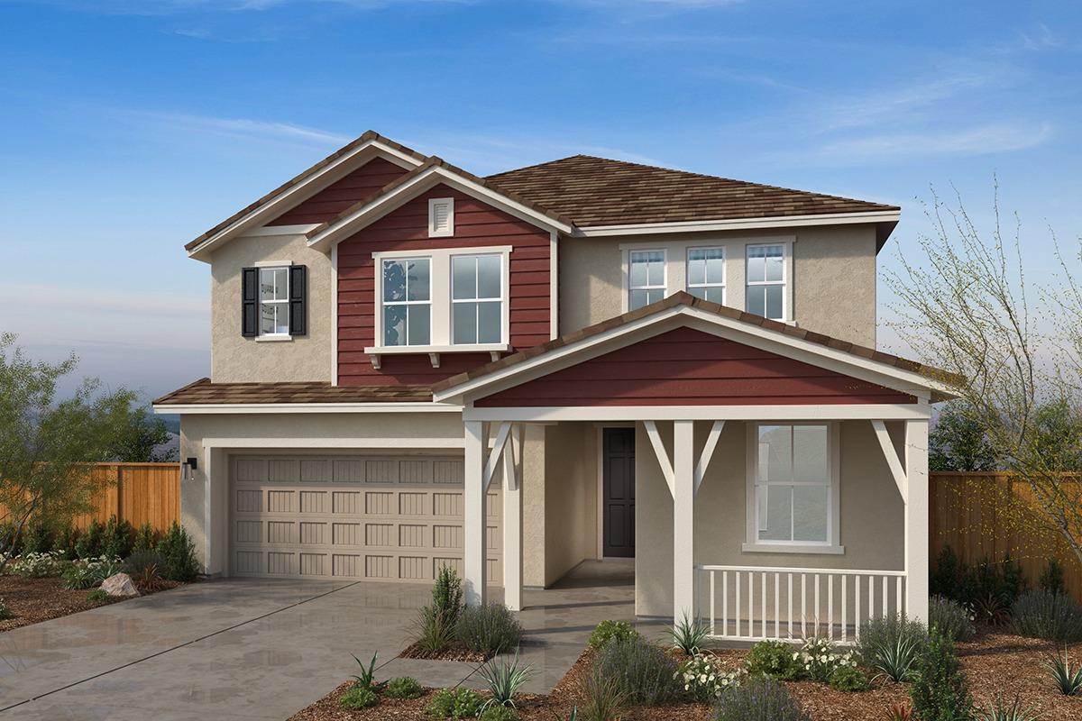 a front view of a house with yard and garage