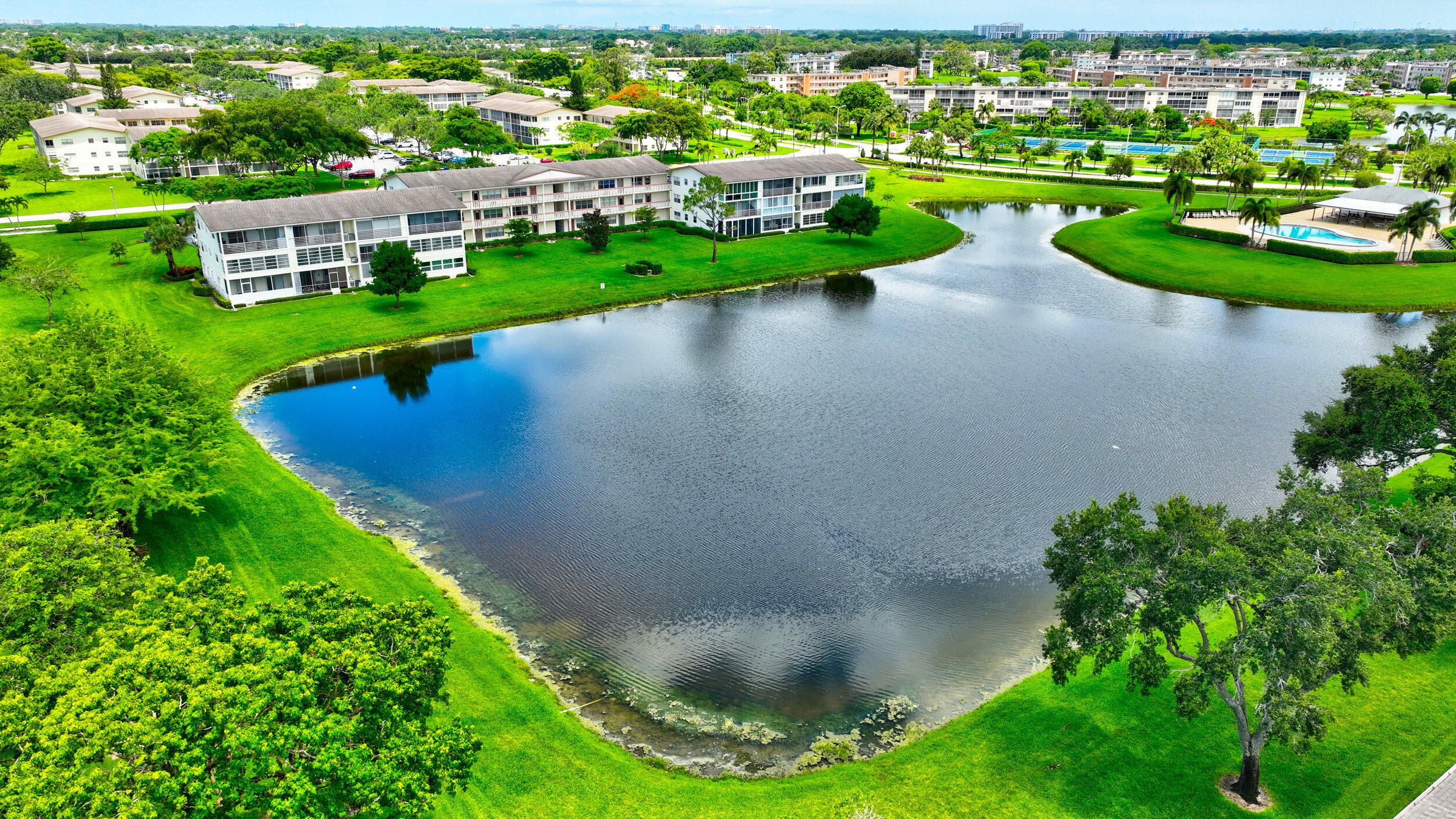 a view of a lake with a city