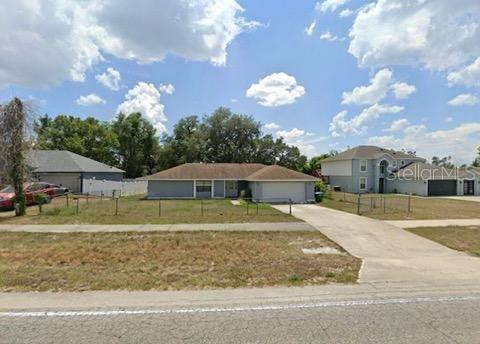 a house with a yard in front of it