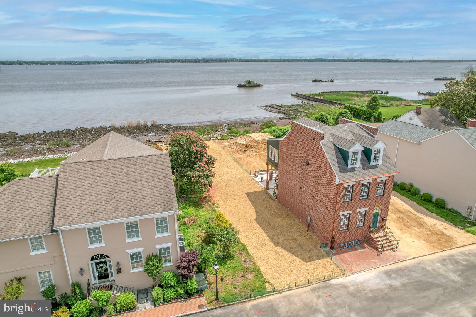 a aerial view of a house with a yard