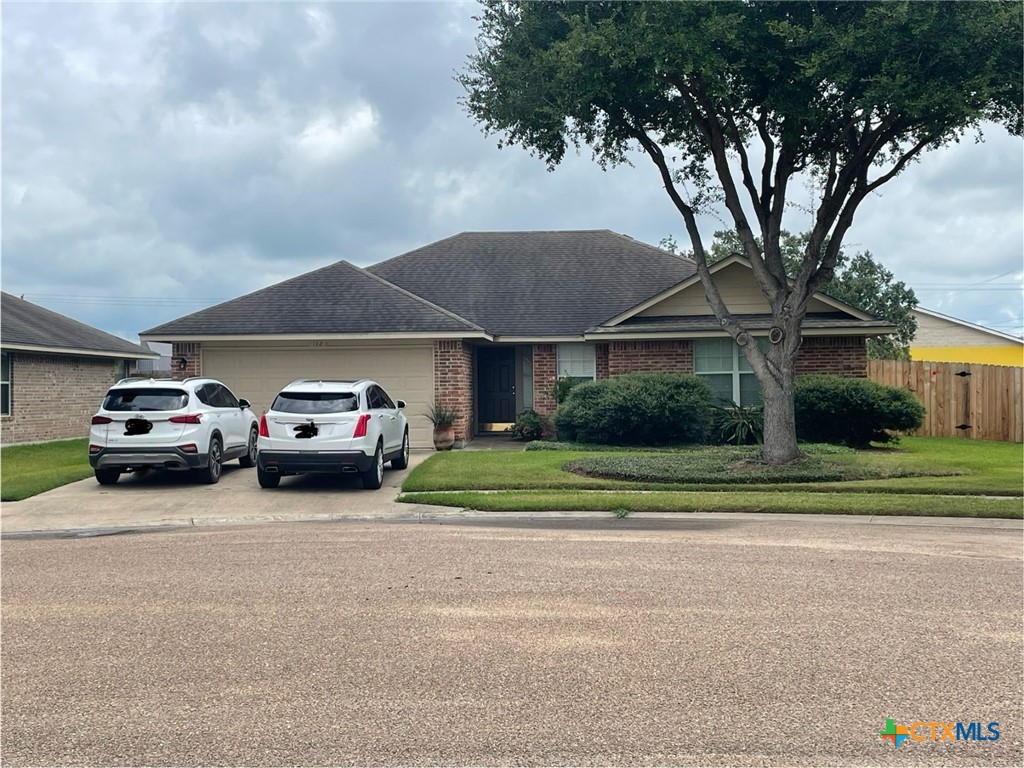 a car parked in front of a house