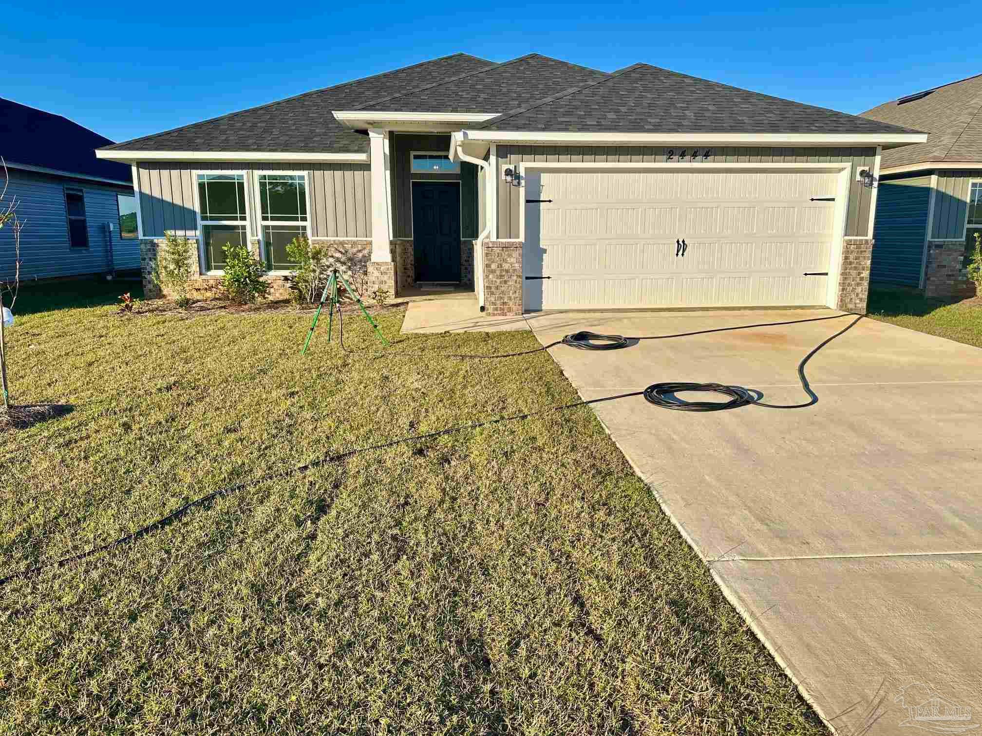 a front view of a house with patio