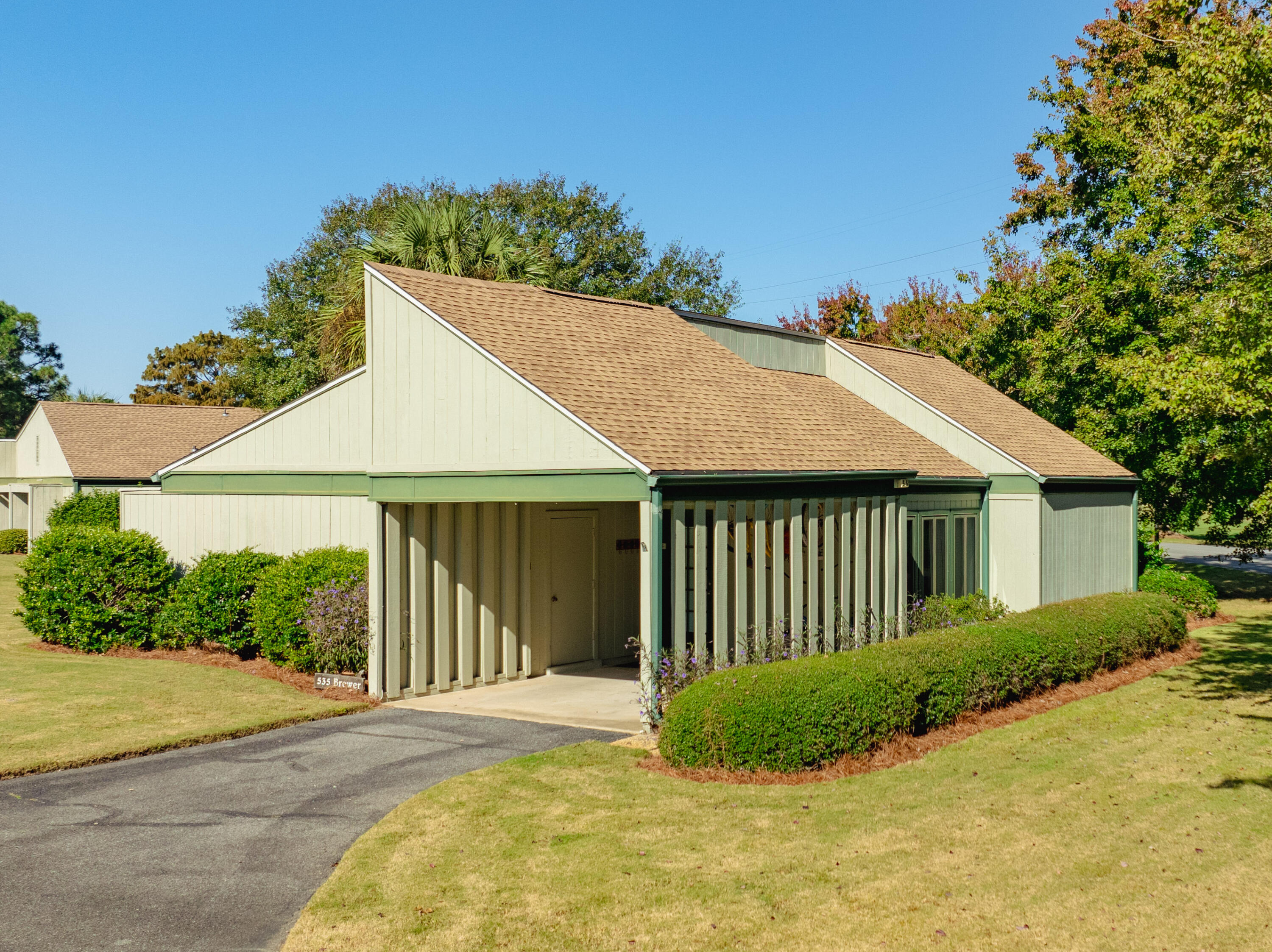 a view of a house with a yard