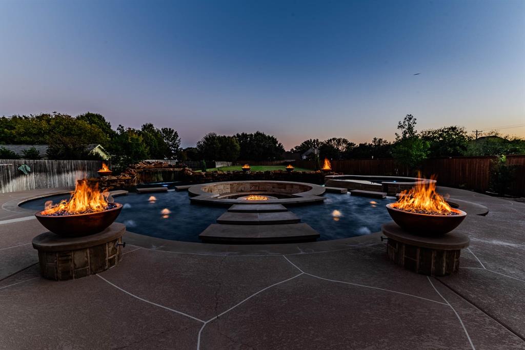 a view of swimming pool with outdoor seating