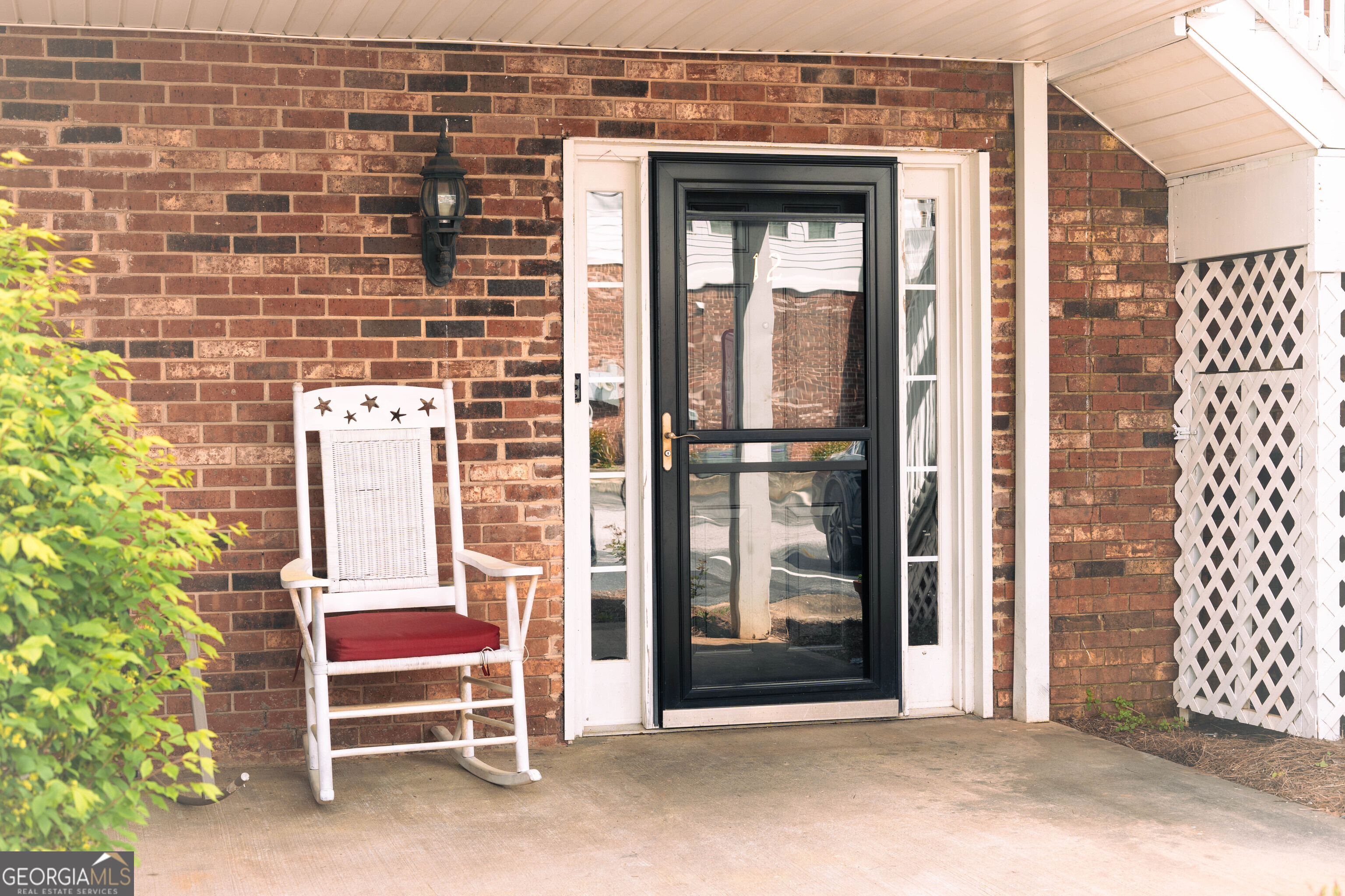 a view of a room with a door and balcony