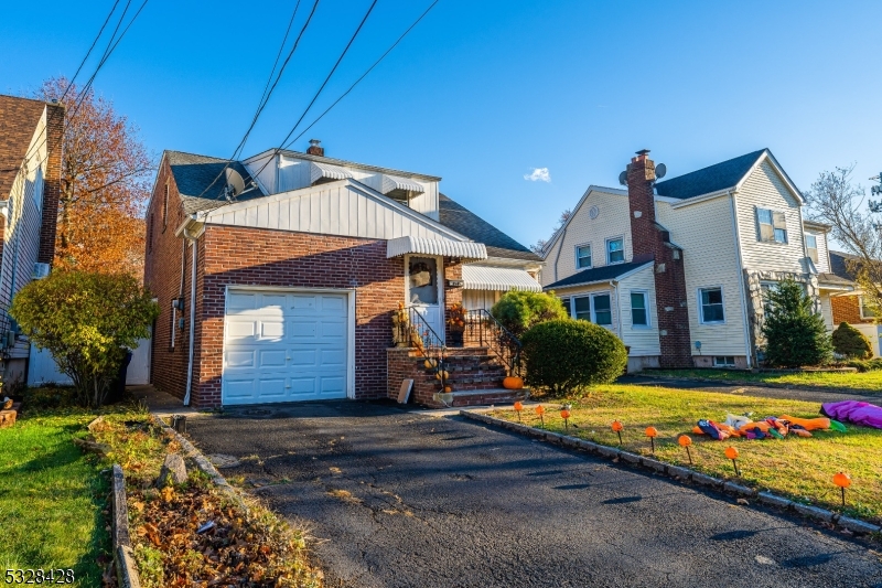 a front view of a house with yard