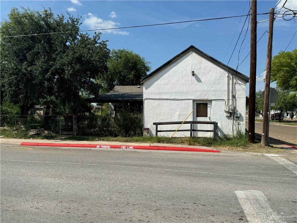 a view of road and small yard