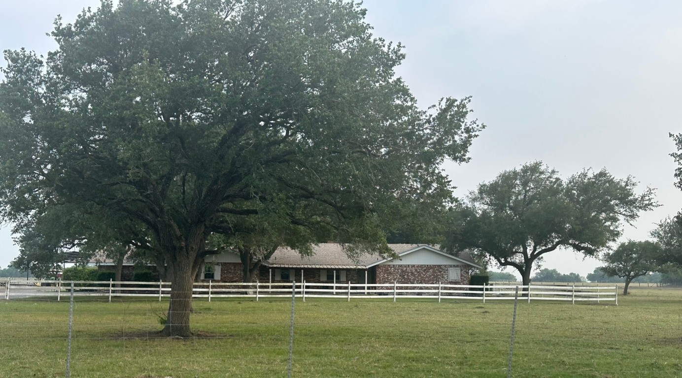 a view of pool with trees