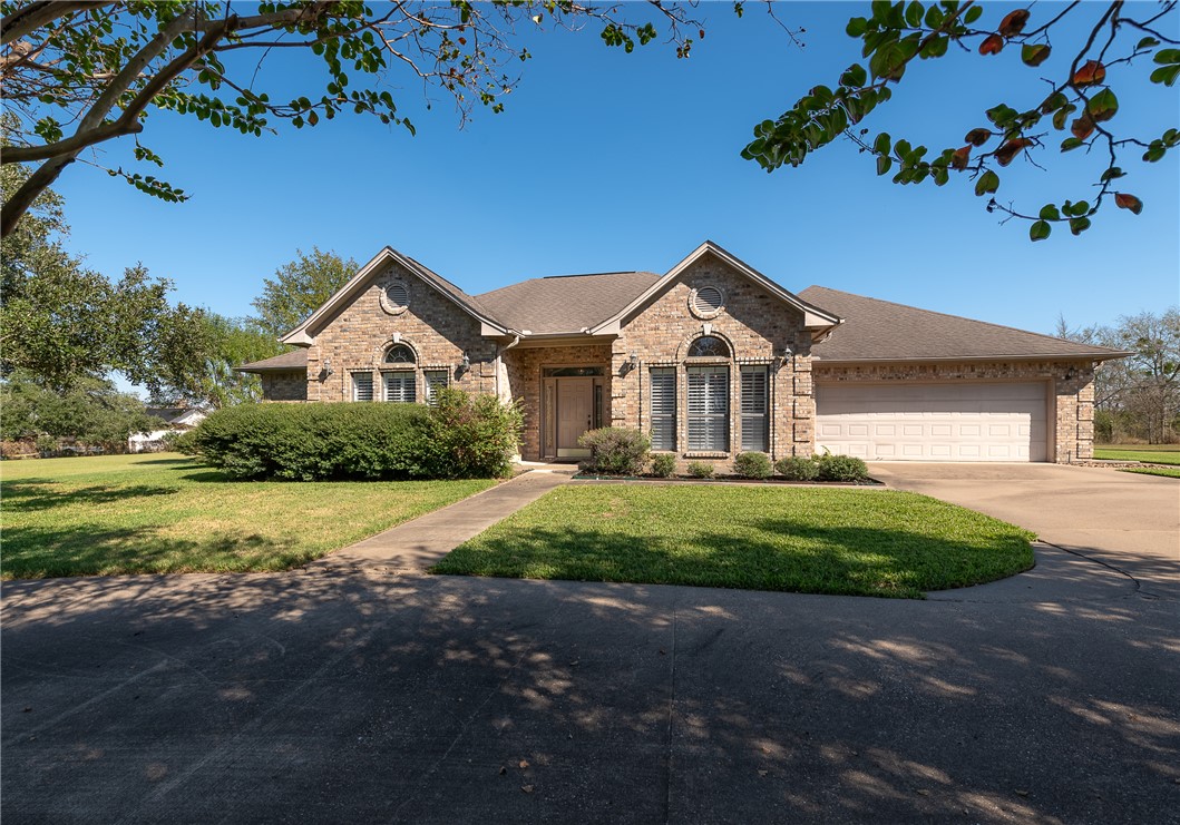 Traditional style house with a garage and a front