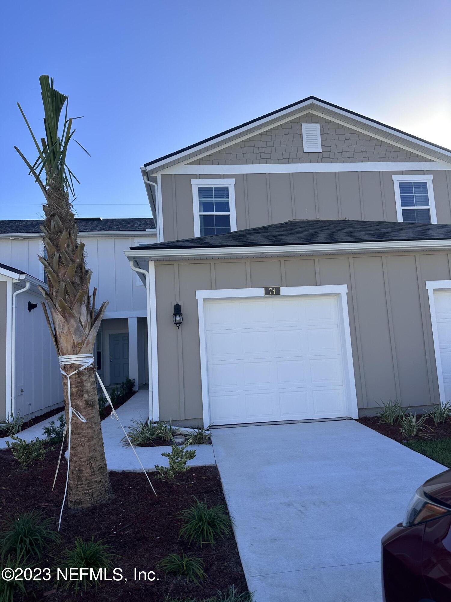 a front view of house with yard