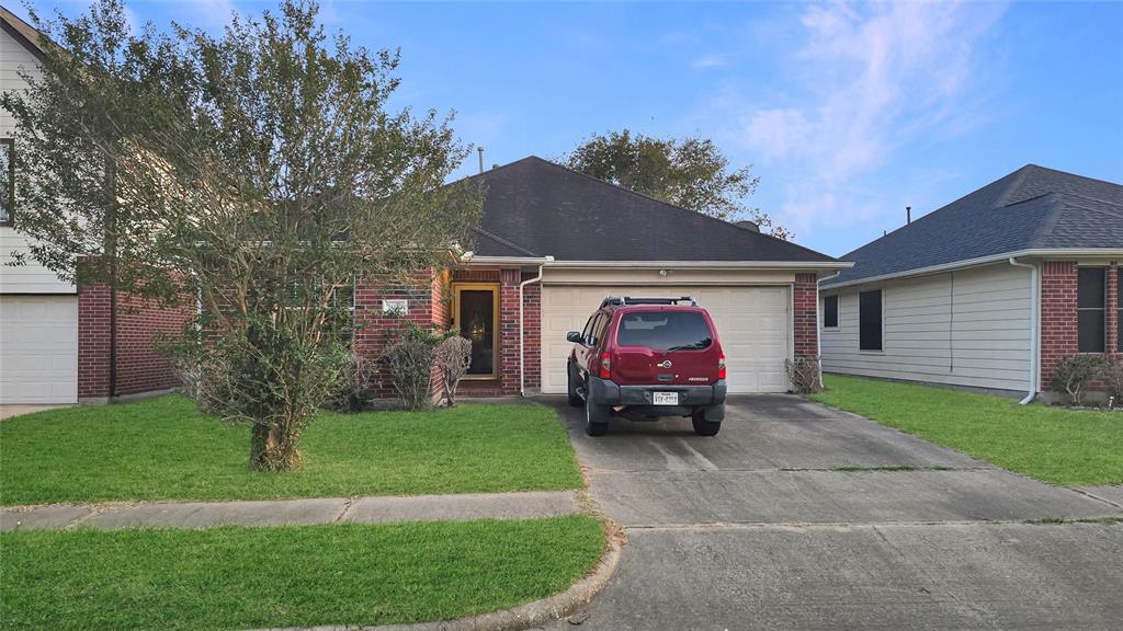 a view of a car in front of house