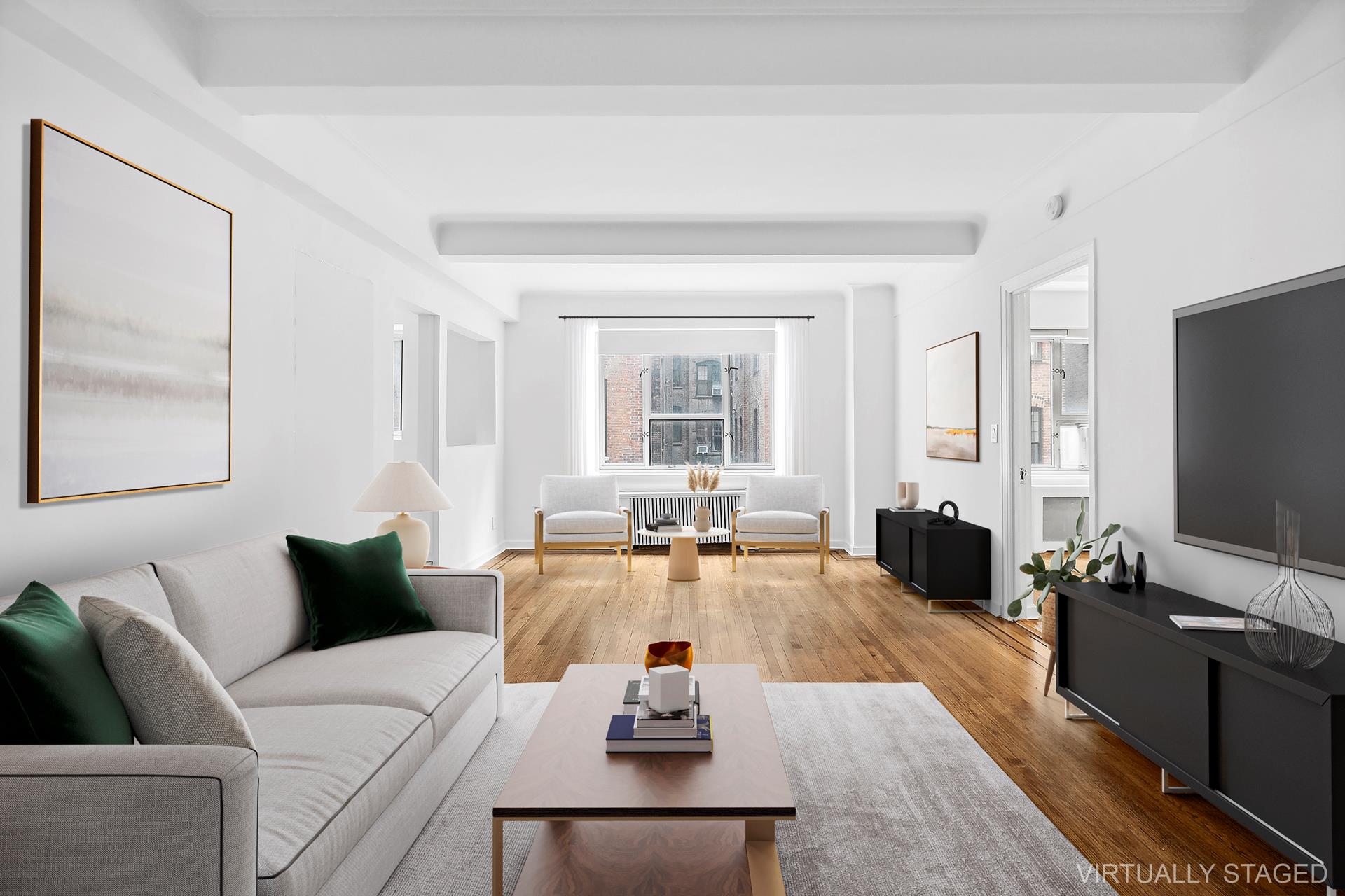 a living room with furniture flat screen tv and window