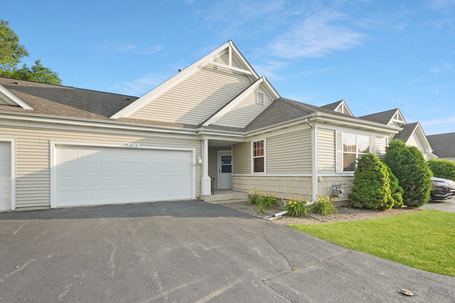 front view of a house and a small yard