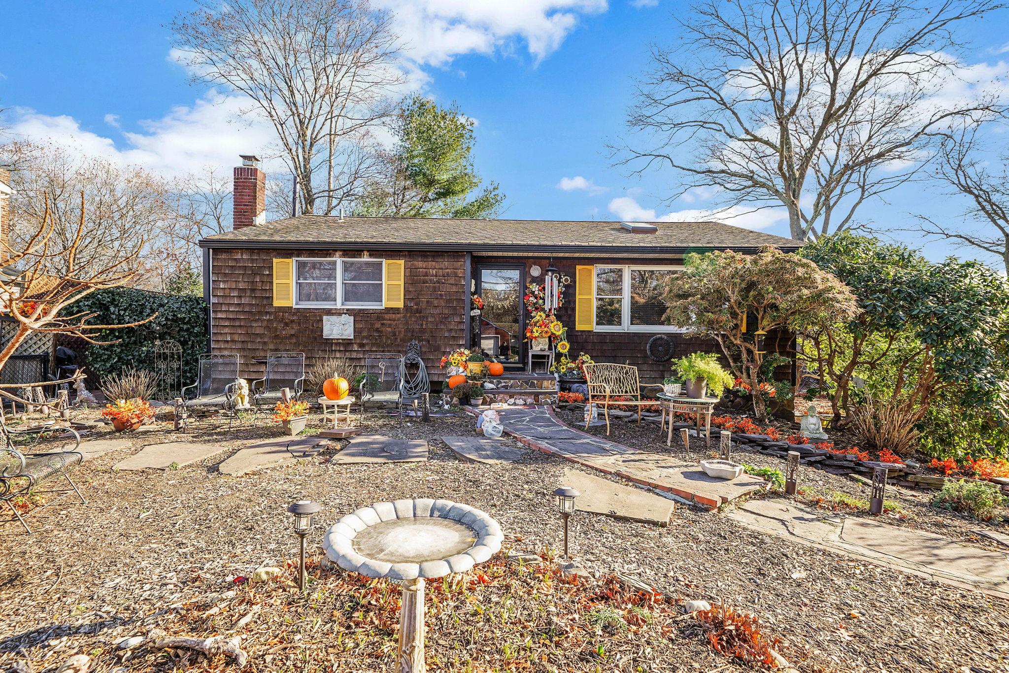 a front view of a house with patio