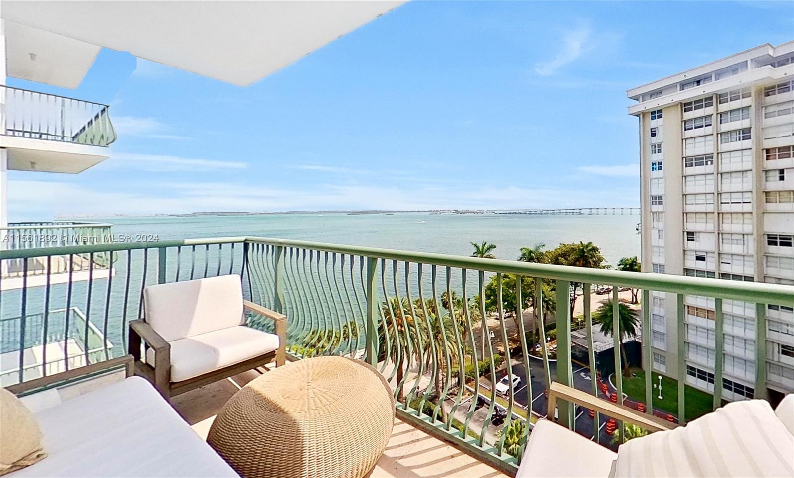 a view of a balcony with wooden floor