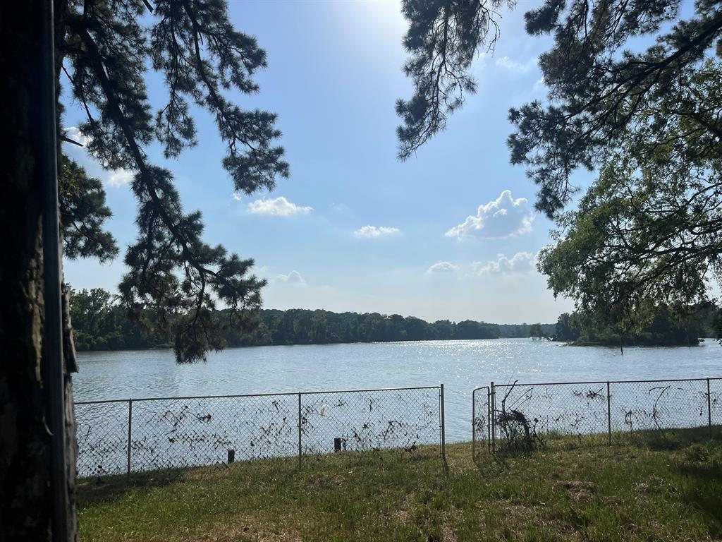 Chain link Fence about 8 feet from bulkhead to  stand out and cast your line