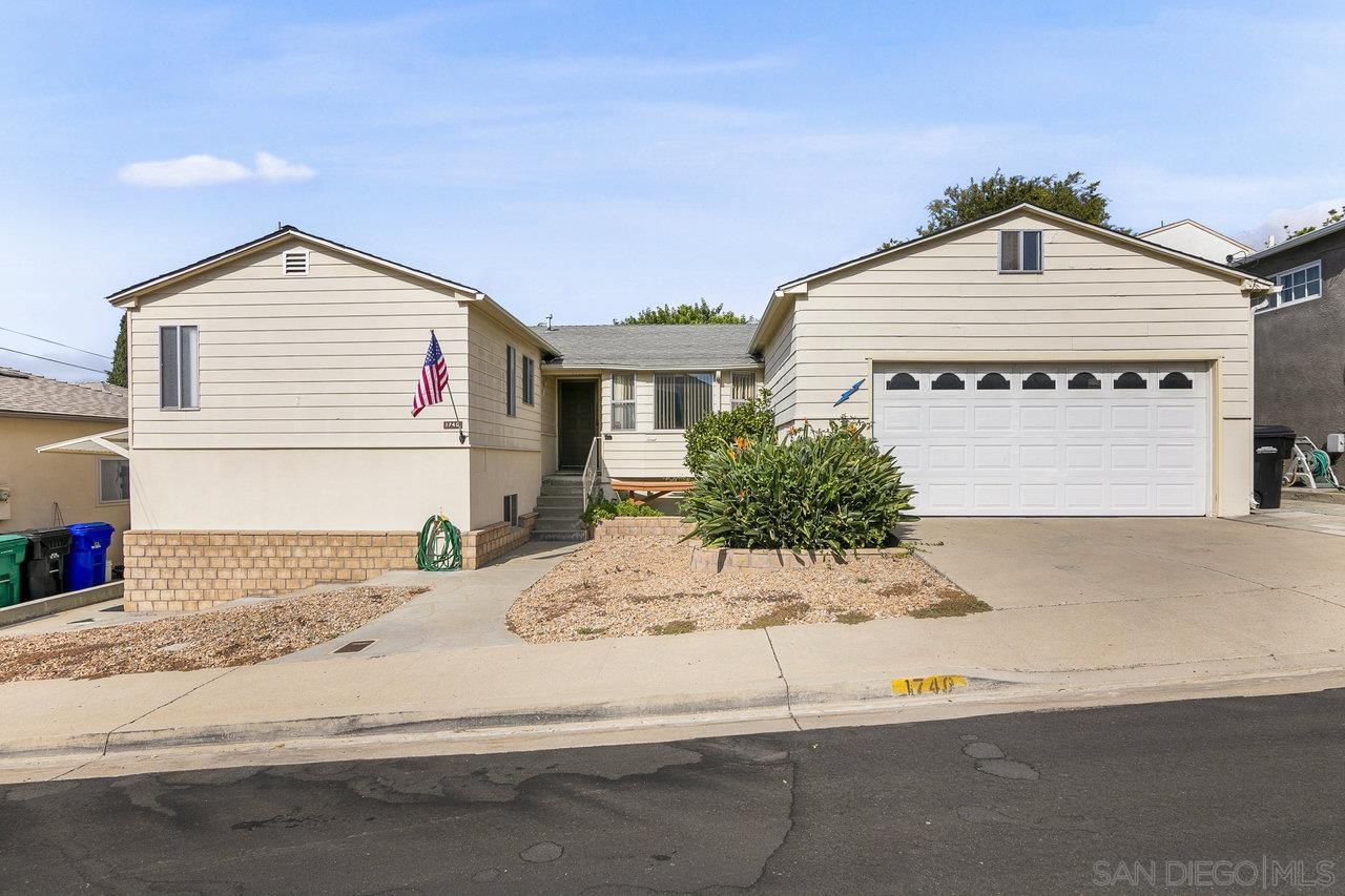 a front view of a house with a outdoor space