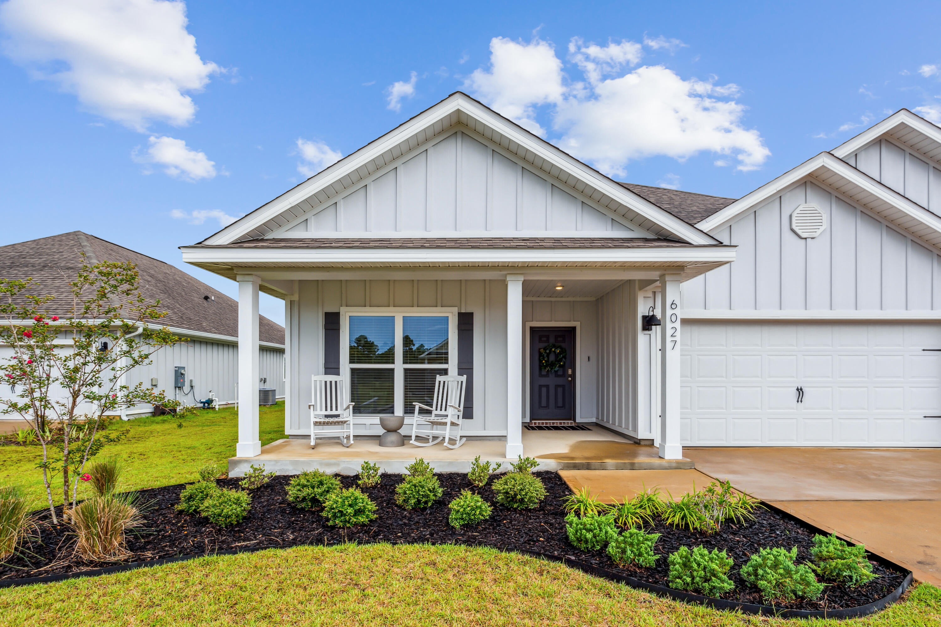 a view of a house with garden