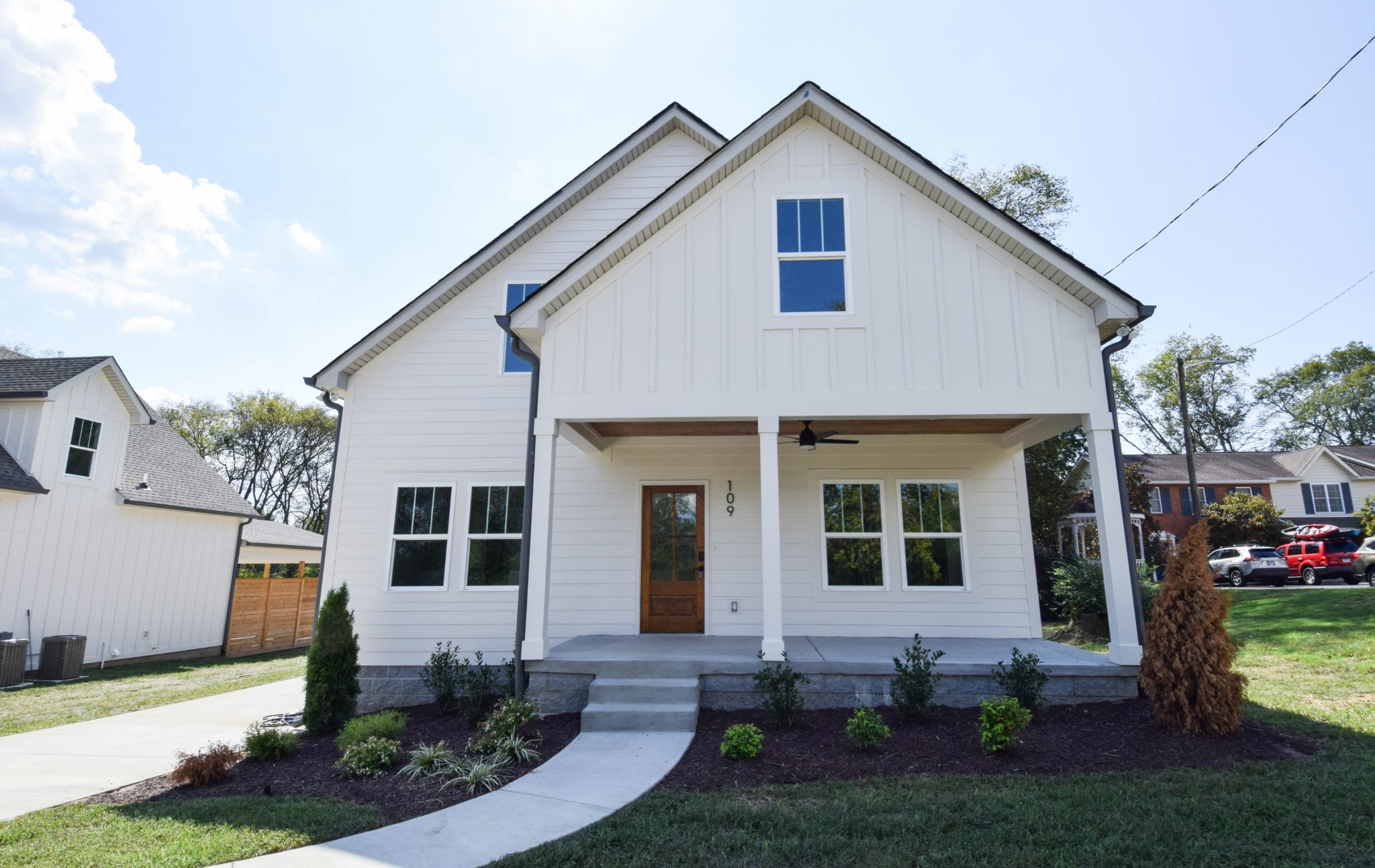 a front view of a house with a yard