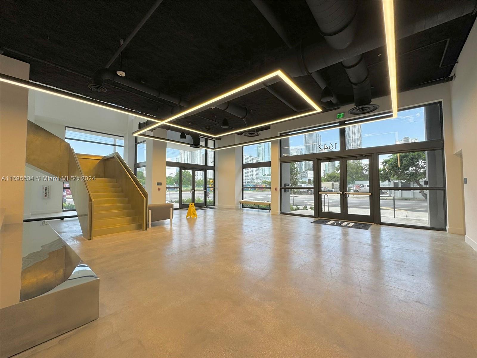 a hallway with wooden floor