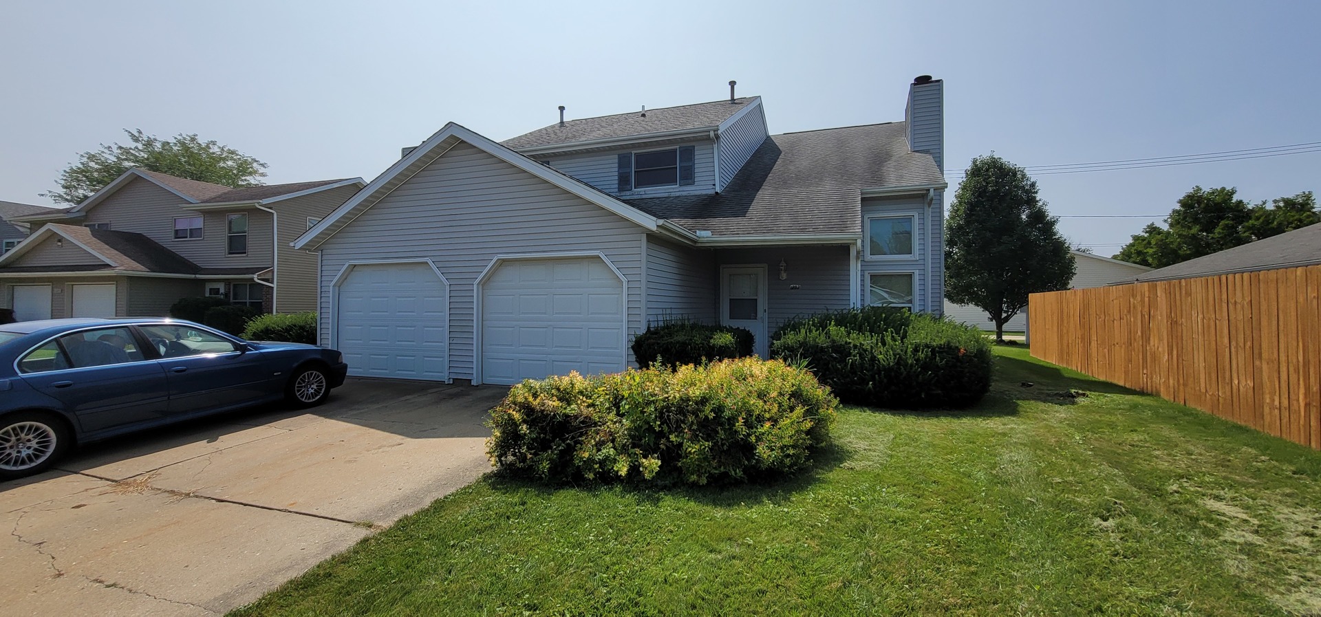 a house view with a garden space