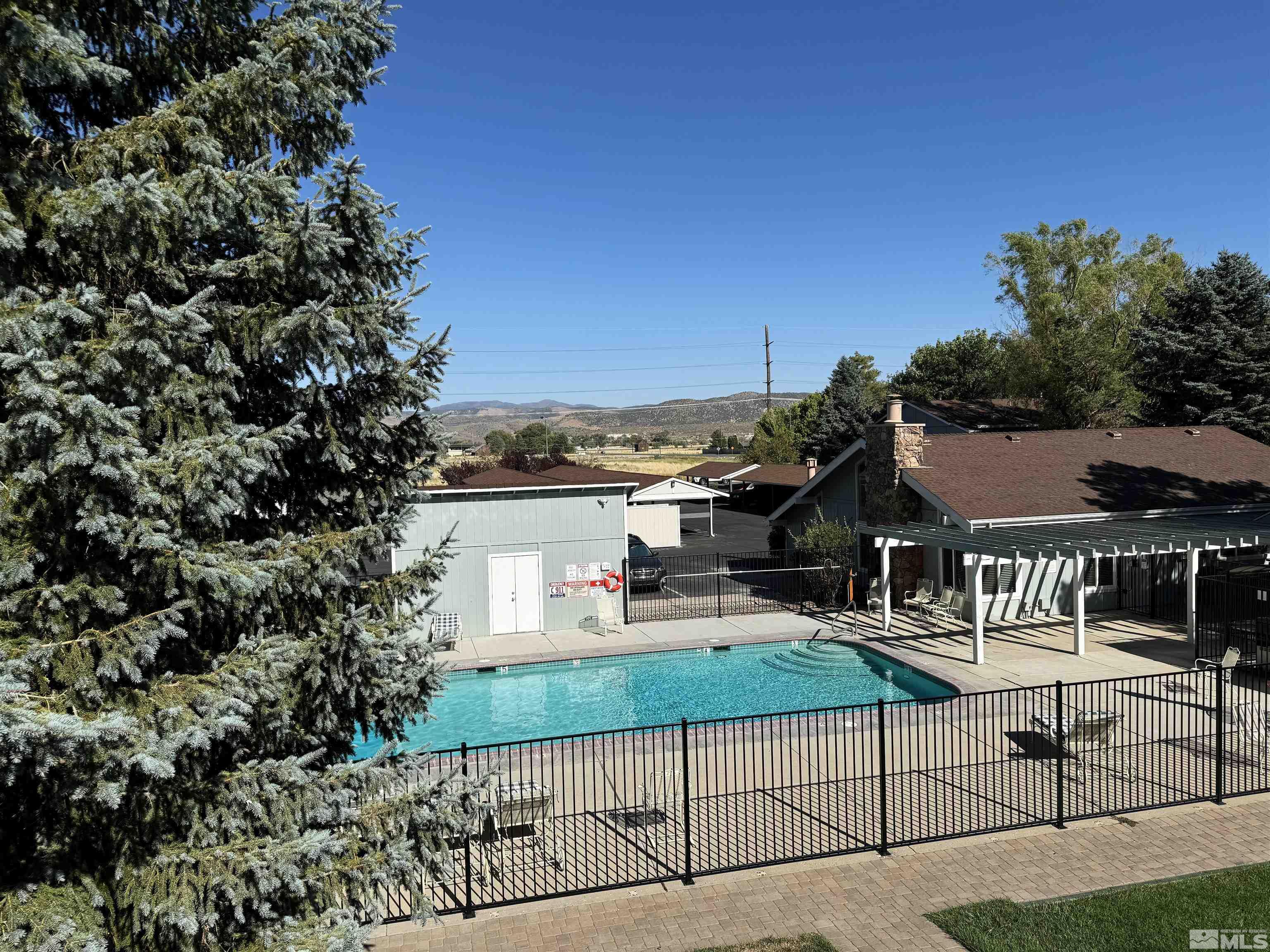 an outdoor view of a house having yard