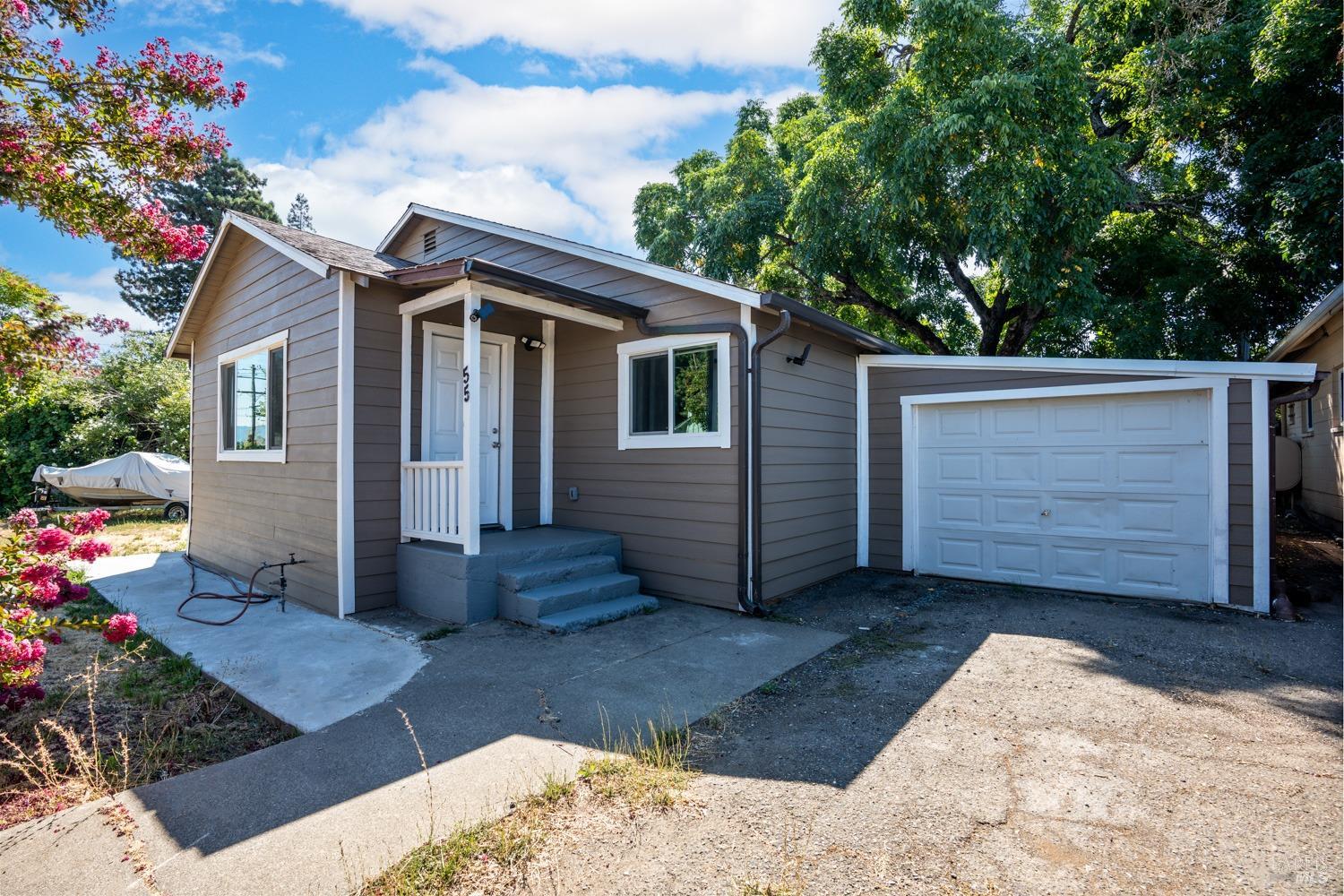 a front view of house with yard