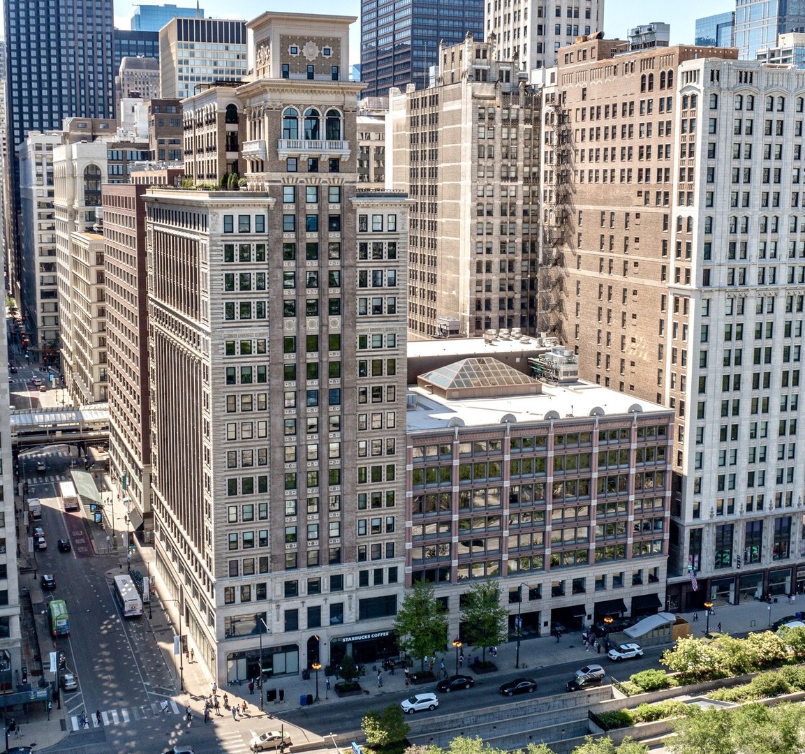 a view of a city with tall buildings