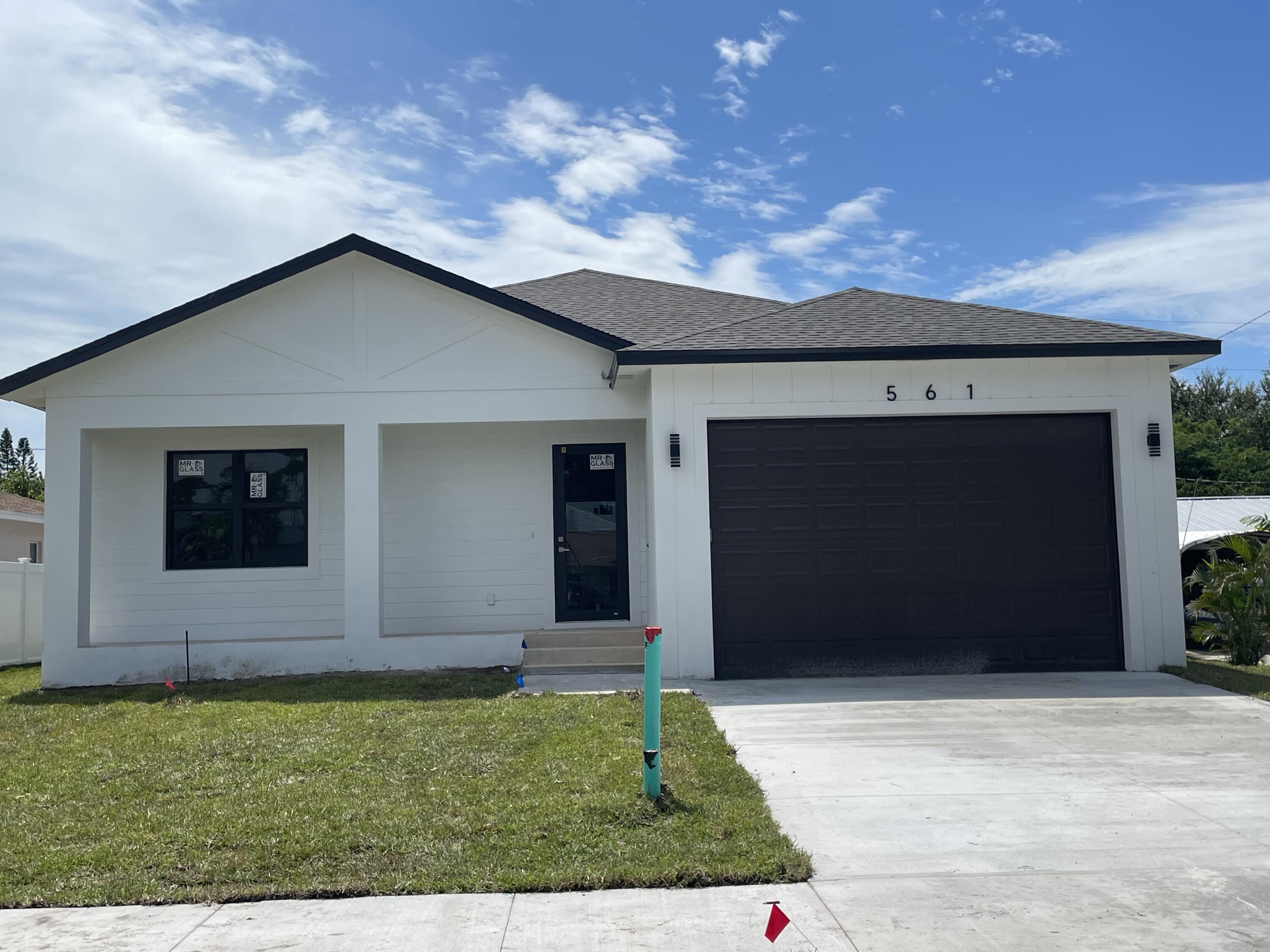 a front view of house with yard