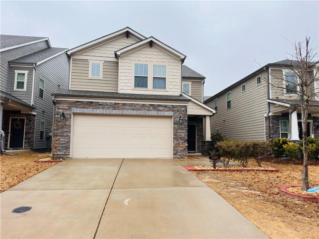 a front view of a house with yard