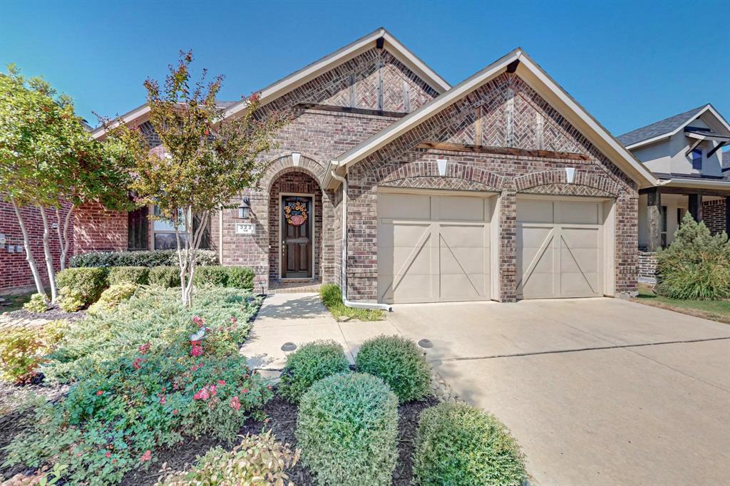 front view of a house with a small yard