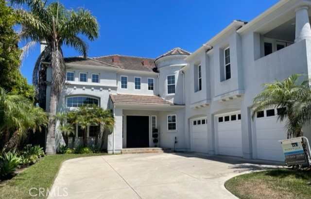 a front view of a house with yard