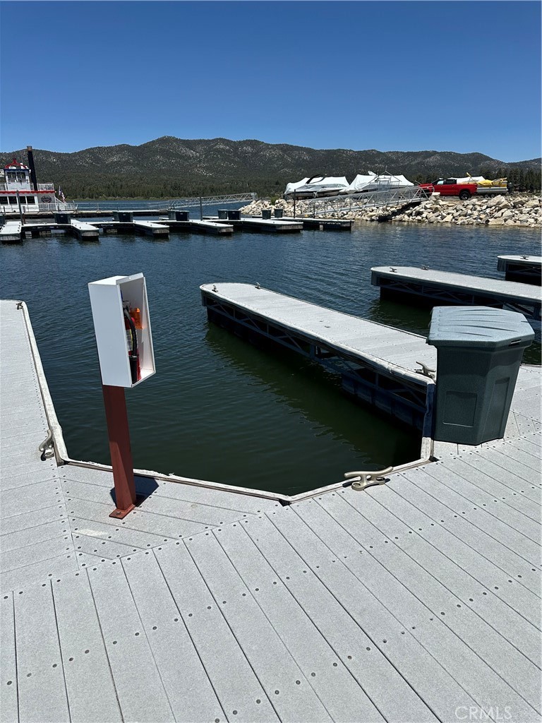 a view of roof deck with lake view