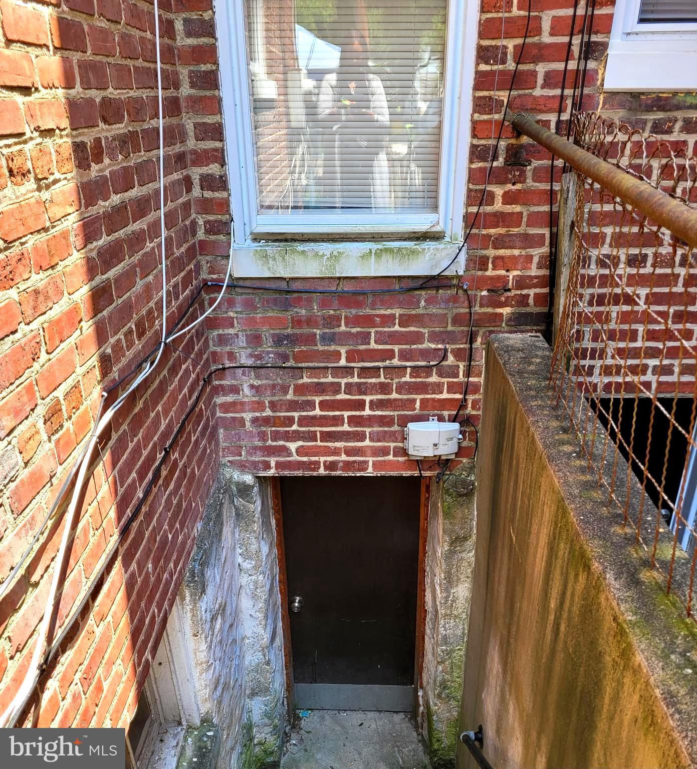 a view of fireplace and window