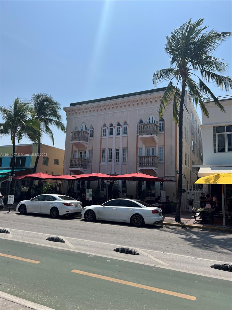 a cars parked in front of a building