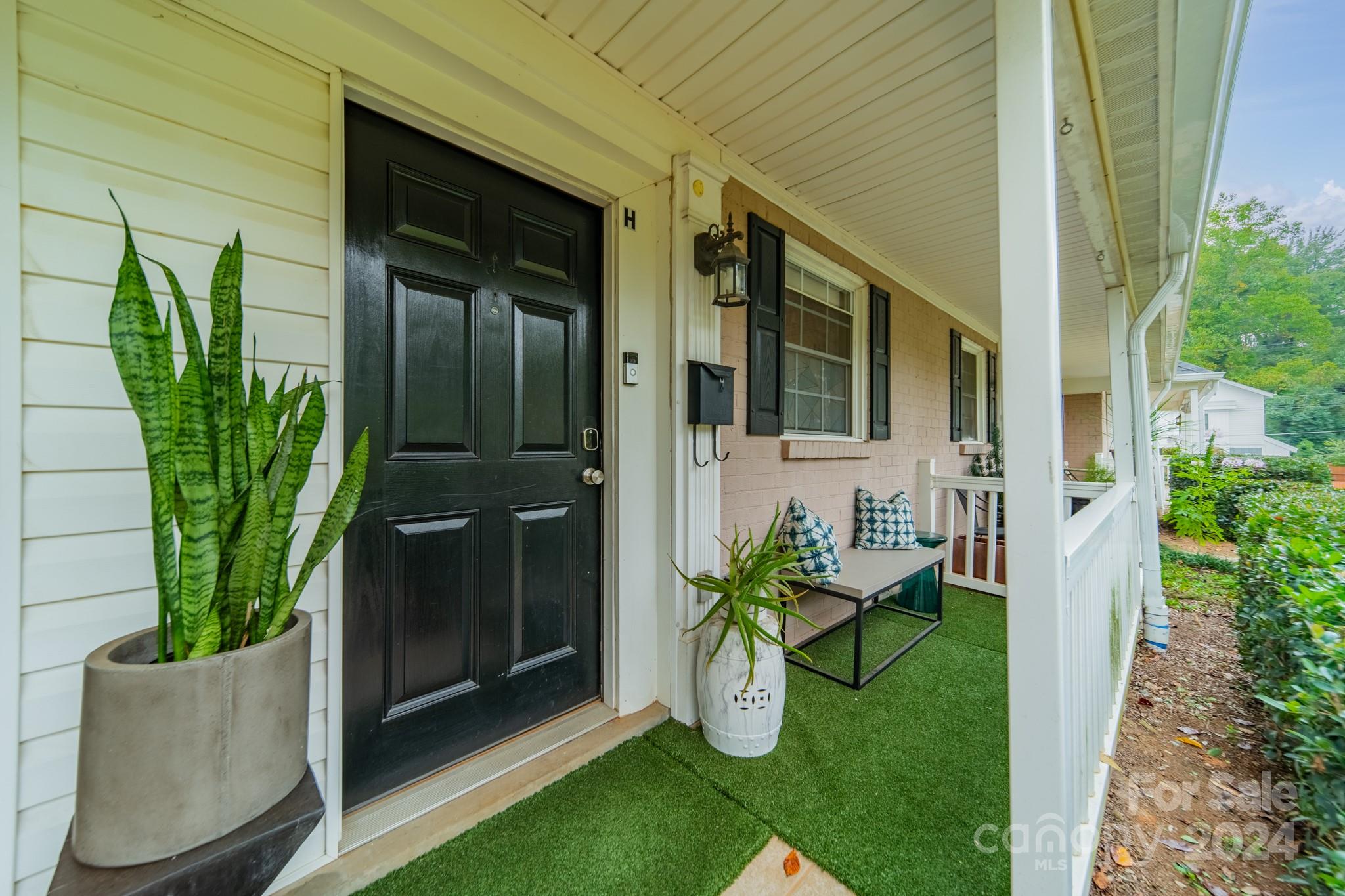 a view of a back yard of the house