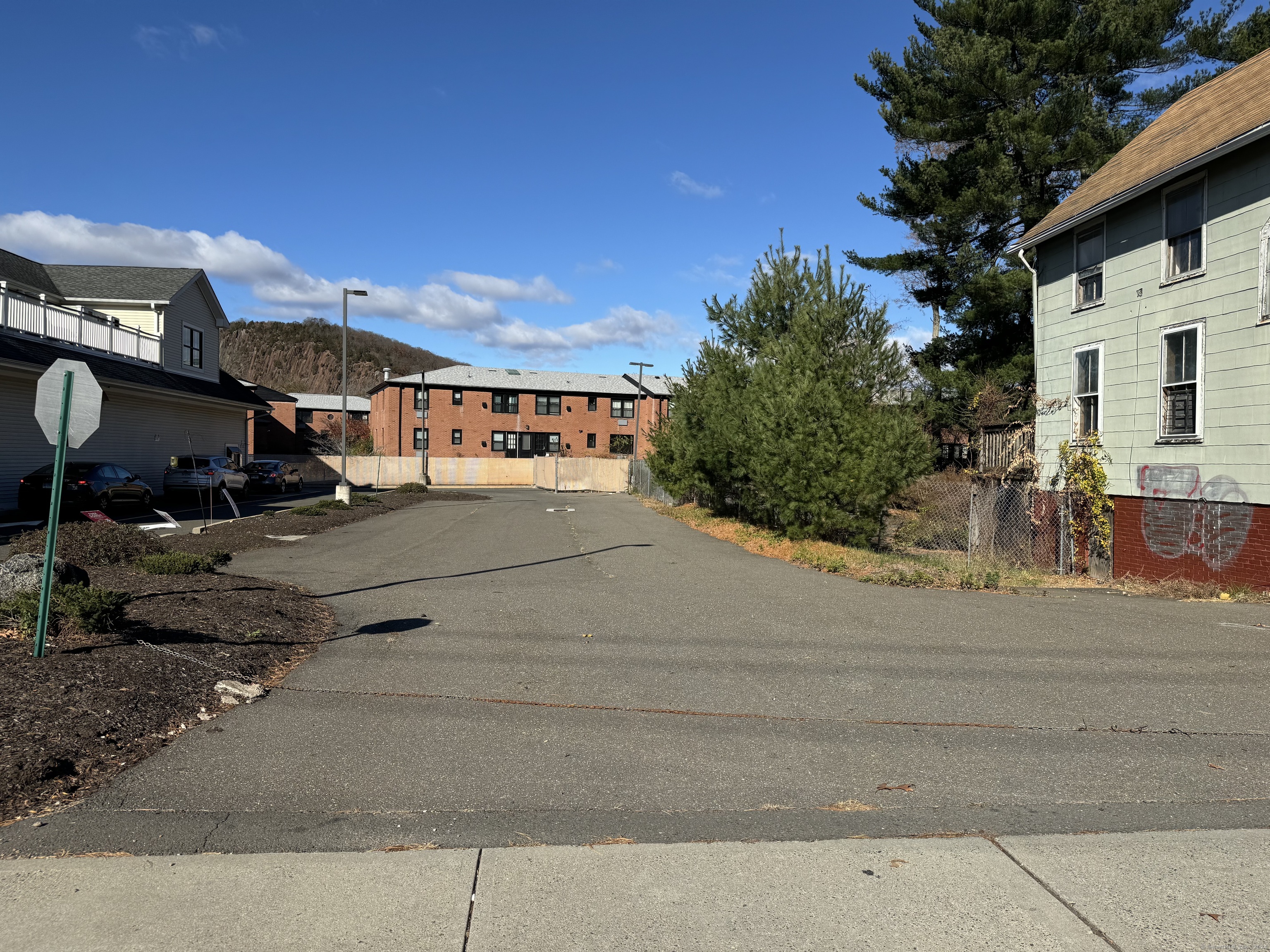 a view of a street with houses